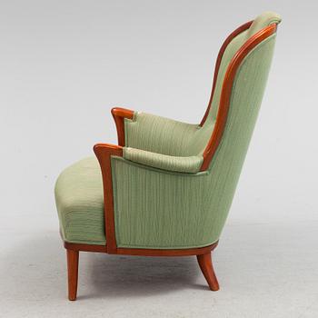 A "Vår Fru" lounge chair by Cral Malmsten.