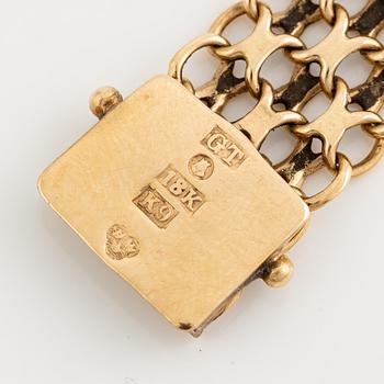 Arm bracelet, 18K gold, x-link.