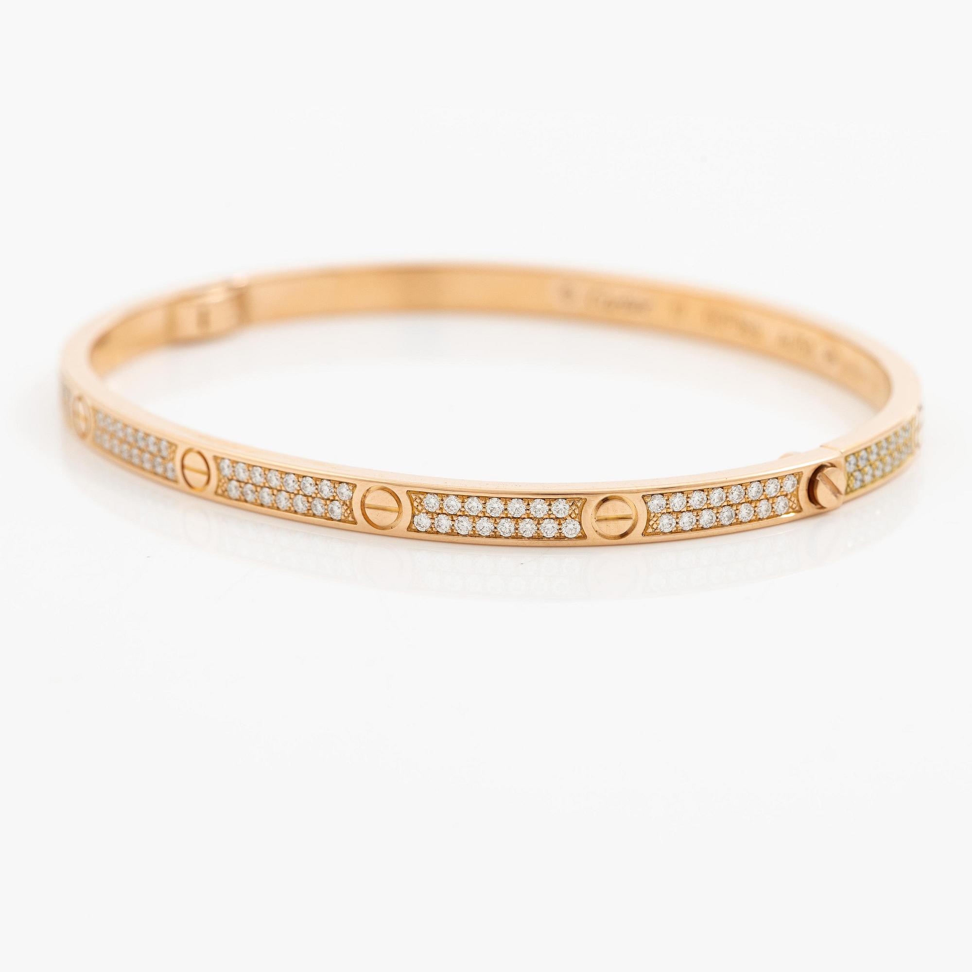 A Cartier bangle "Love" 18K rose gold with round brilliant-cut diamonds.
