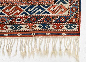 A semi-antique Turkish rug, 175 x 123 cm.