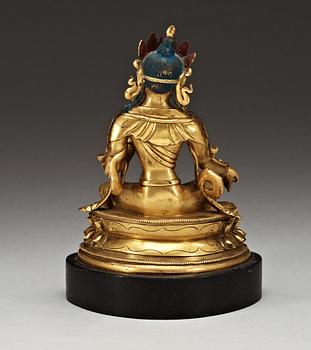 A gilt bronze figure of Green Tara, Sino-Tibetan, 18th Century.