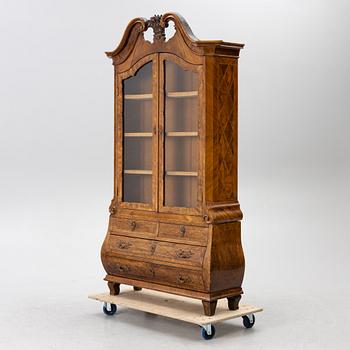 A scroll top vintrine cabinet, 19th century.