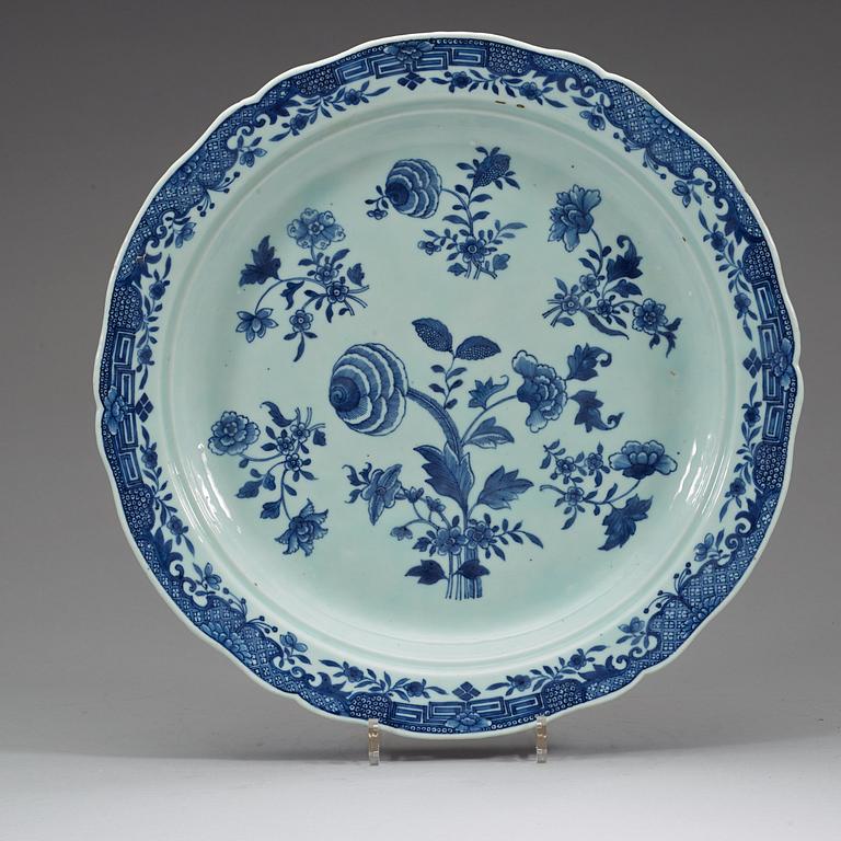 A pair of large blue and white serving dishes with strainers, Qing dynasty, Qianlong (1736-95).