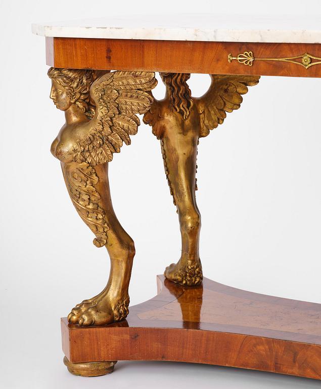 A presumably Austrian Empire centre table, early 19th century.