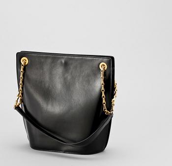 1339. A 1970s black leather shoulder bag by Celine.