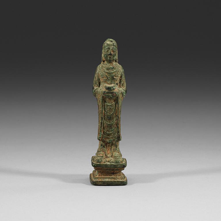 A standing bronze Buddha, presumably Tang/Liao dynasty (618-1125).