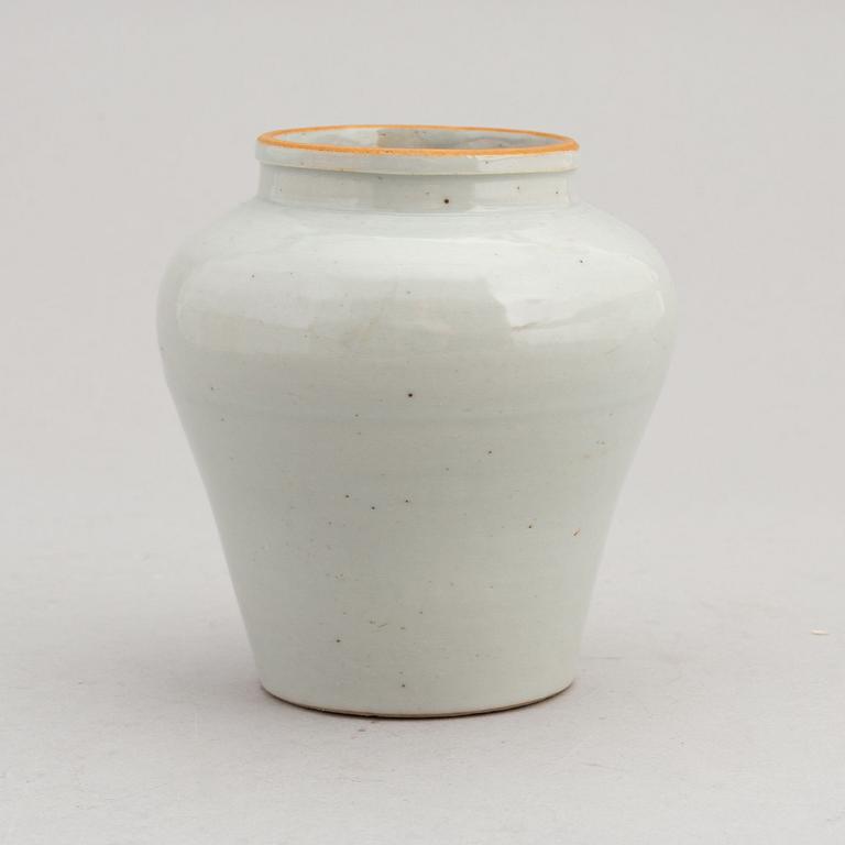 A Chinese white or light grey glazed jar, Ming Dynasty (1368-1644).