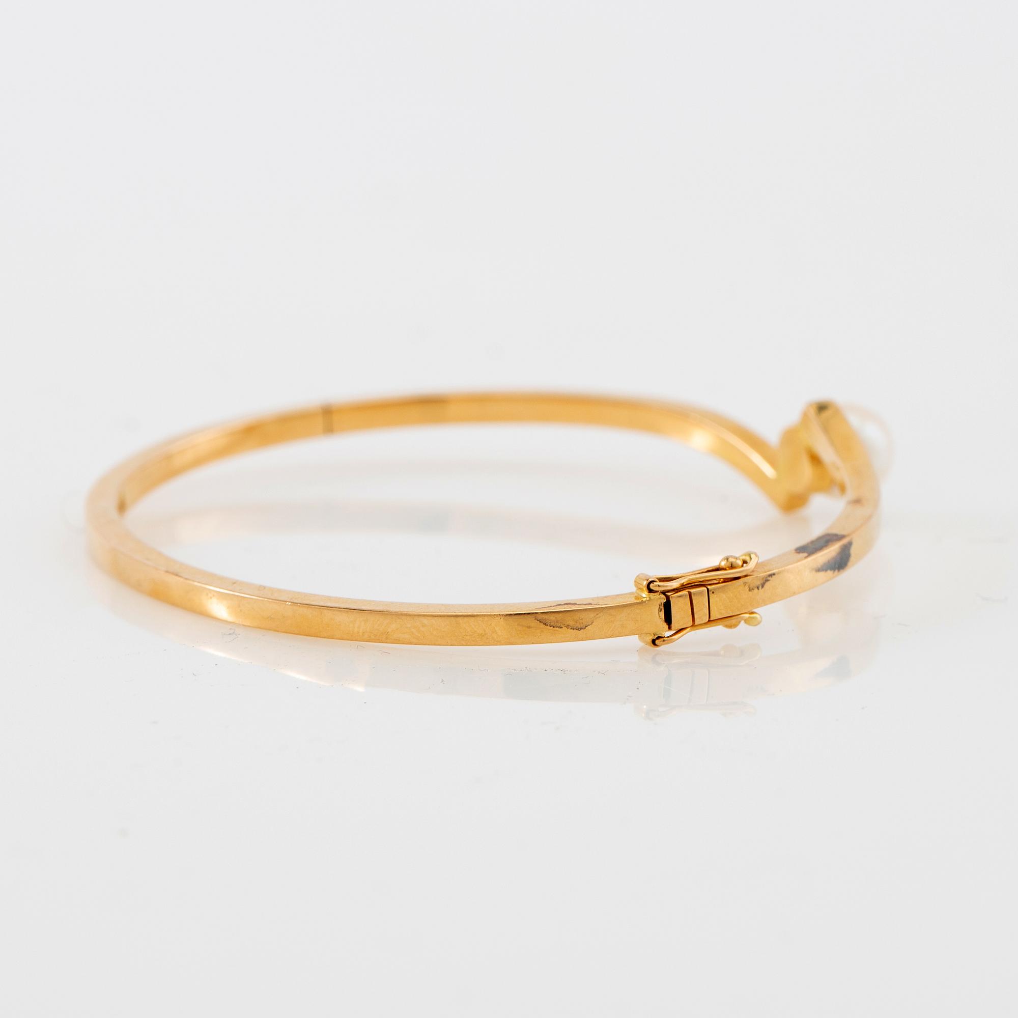 Armring, 18K guld och pärla, Stigbert, Stockholm, 1964.