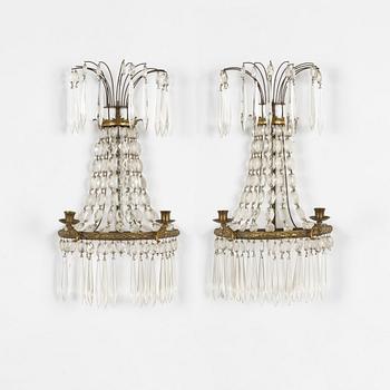 A pair of Gustavian style wall sconces, early 20th Century.
