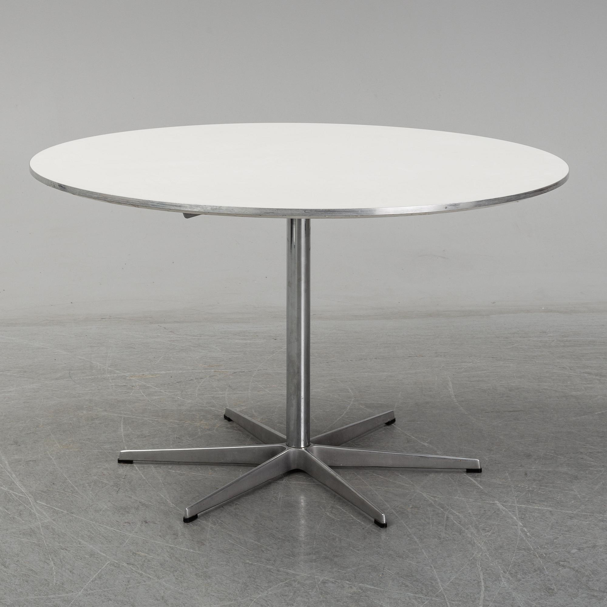 ARNE JACOBSEN, a table from Friz Hansen, Denmark, 2002.