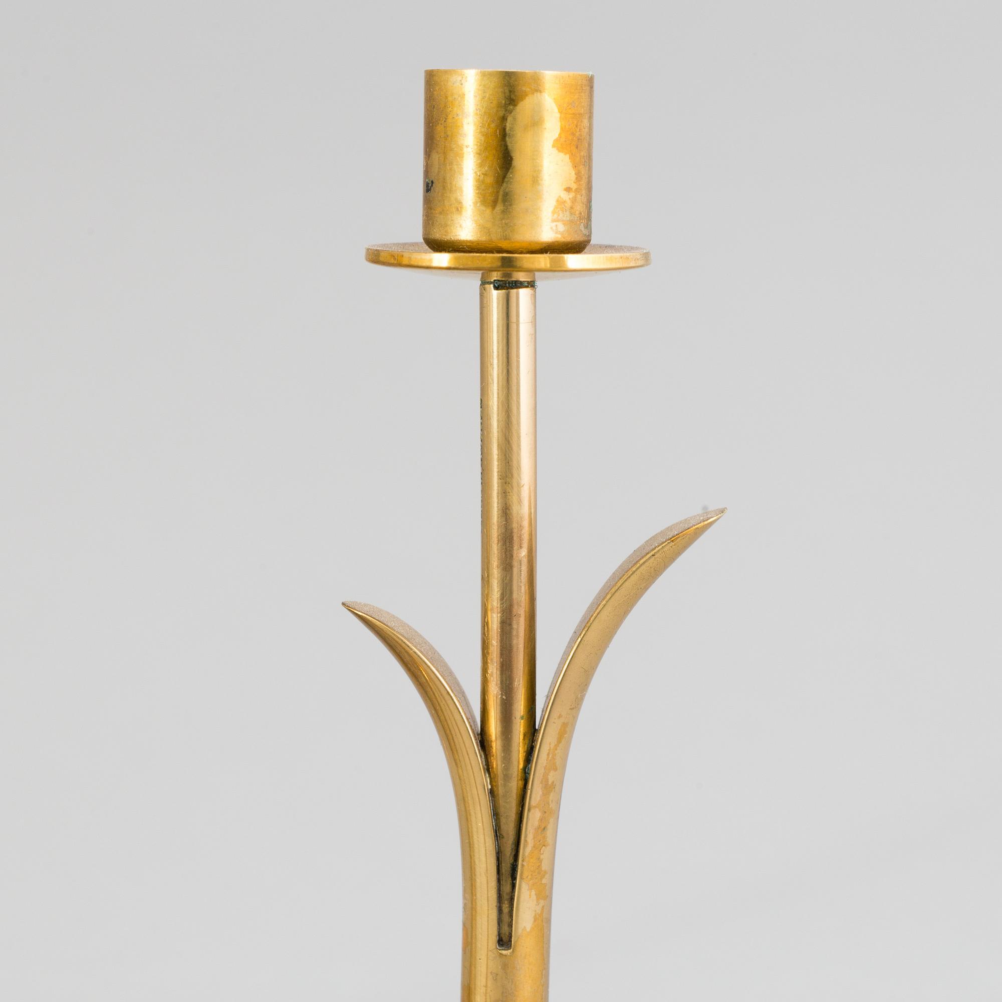 A brass candelabrum by Gunnar Ander for Ystad Metall.