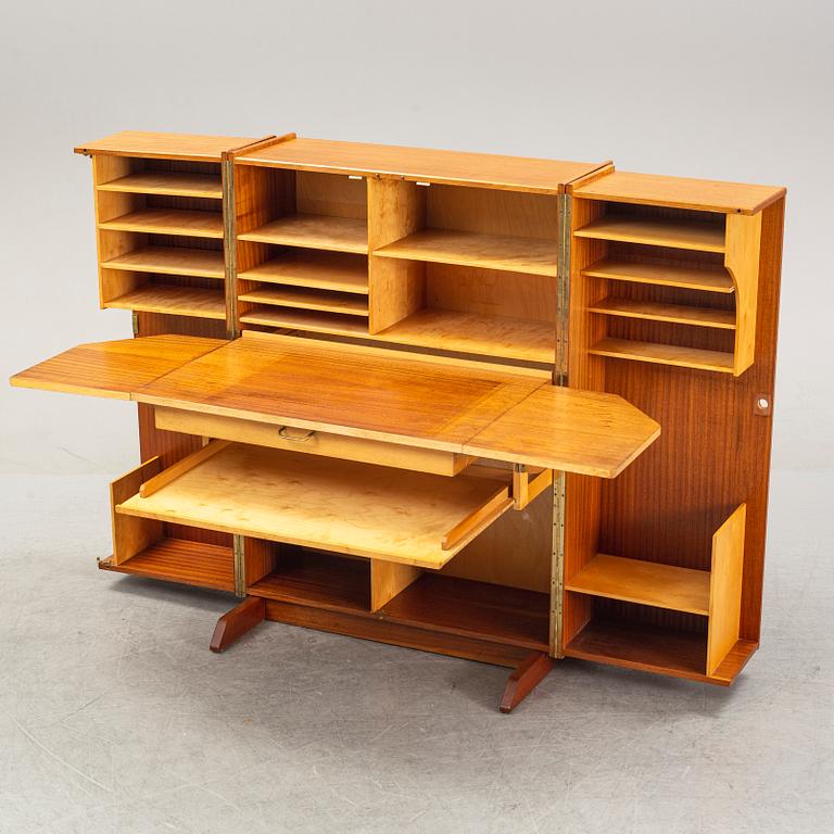 A mahogany veneered convertible cabinet, mid 20th Century.