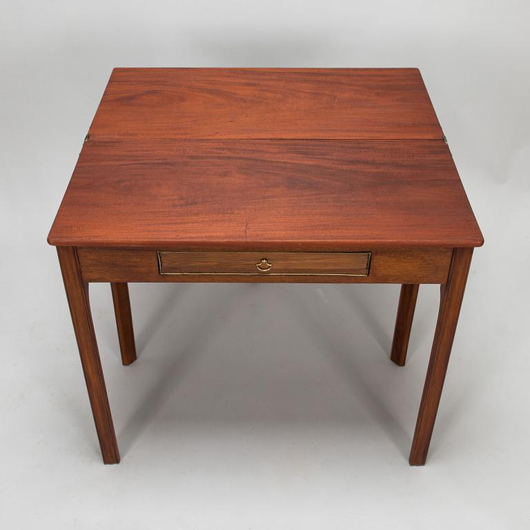 An 19th century game table England.