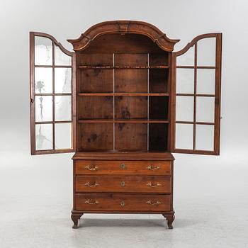 Display cabinet, circa 1900.