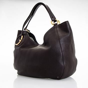 Gucci, an "Interlocking G" bag.