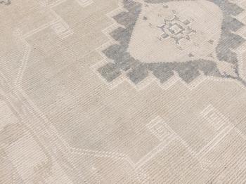 An oriental carpet, ca 312 x 256 cm.