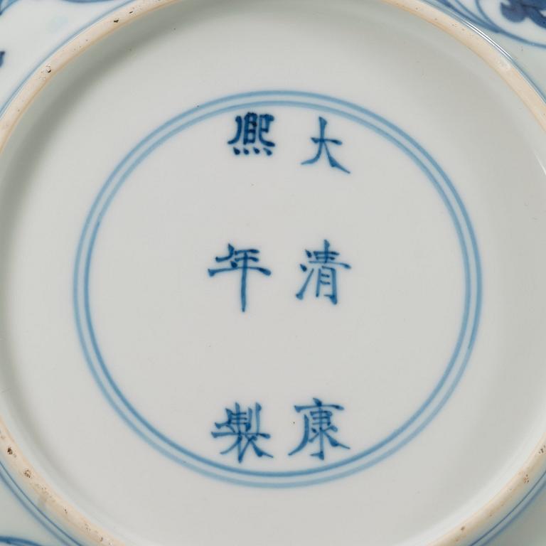 A pair of blue and white lotus dishes, Qing dynasty (1644-1912) with Kangxi six characters mark.