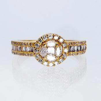 Ring 18K gold navette, brilliant and baguette-cut diamonds approx 1,5 ct in total.