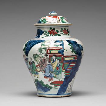 571. A Transitional wucai baluster vase with cover, 17th Century, Shunzhi (1644-1662).