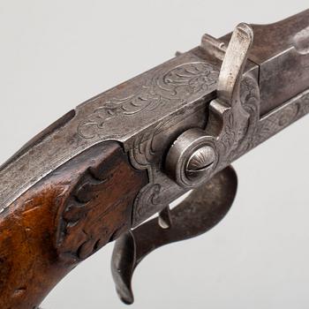 A mid 19th century Belgian percussion pistol.