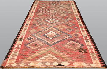 A carpet, Nomad Kelim, c. 345 x 155 cm.