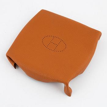 Hermès, an orange Clemence 'Mises et Relances' change tray, 2012.