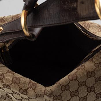 Gucci, a handbag.