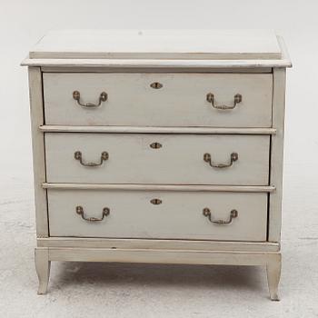 A chest of drawers, around 1900.