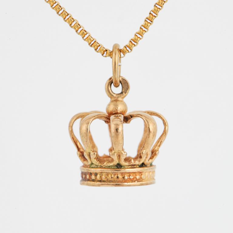 Crown pendant with chain.