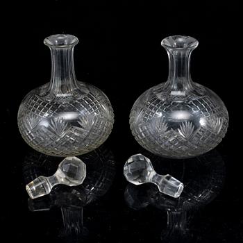 A set of four bottles with stoppers, 20th Century.