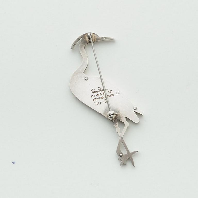 A Wiwen Nilsson sterling brooch of a standing crane, Lund 1954.