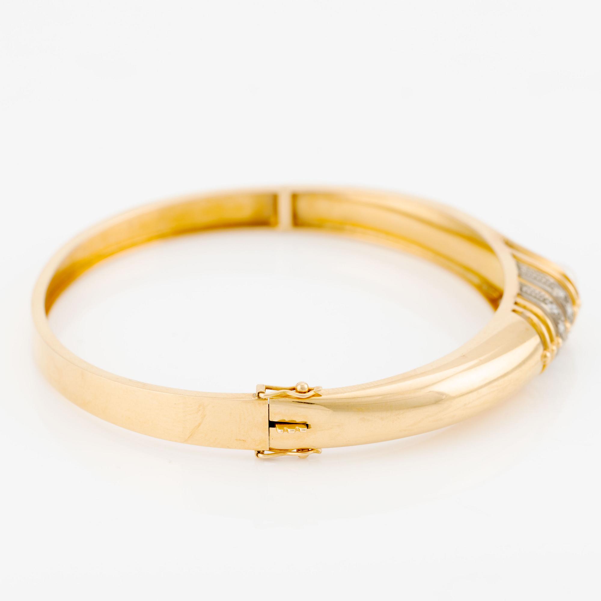 Bangle, 18K gold with pearls and small octagon-cut diamonds.