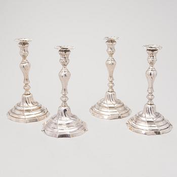 Four Central European rococo style silver candlesticks, second half of 19th Century.