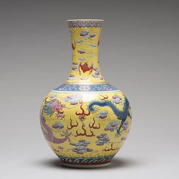 A yellow glazed five clawed dragon vase, probably late Qing dynasty with Guangxus mark.