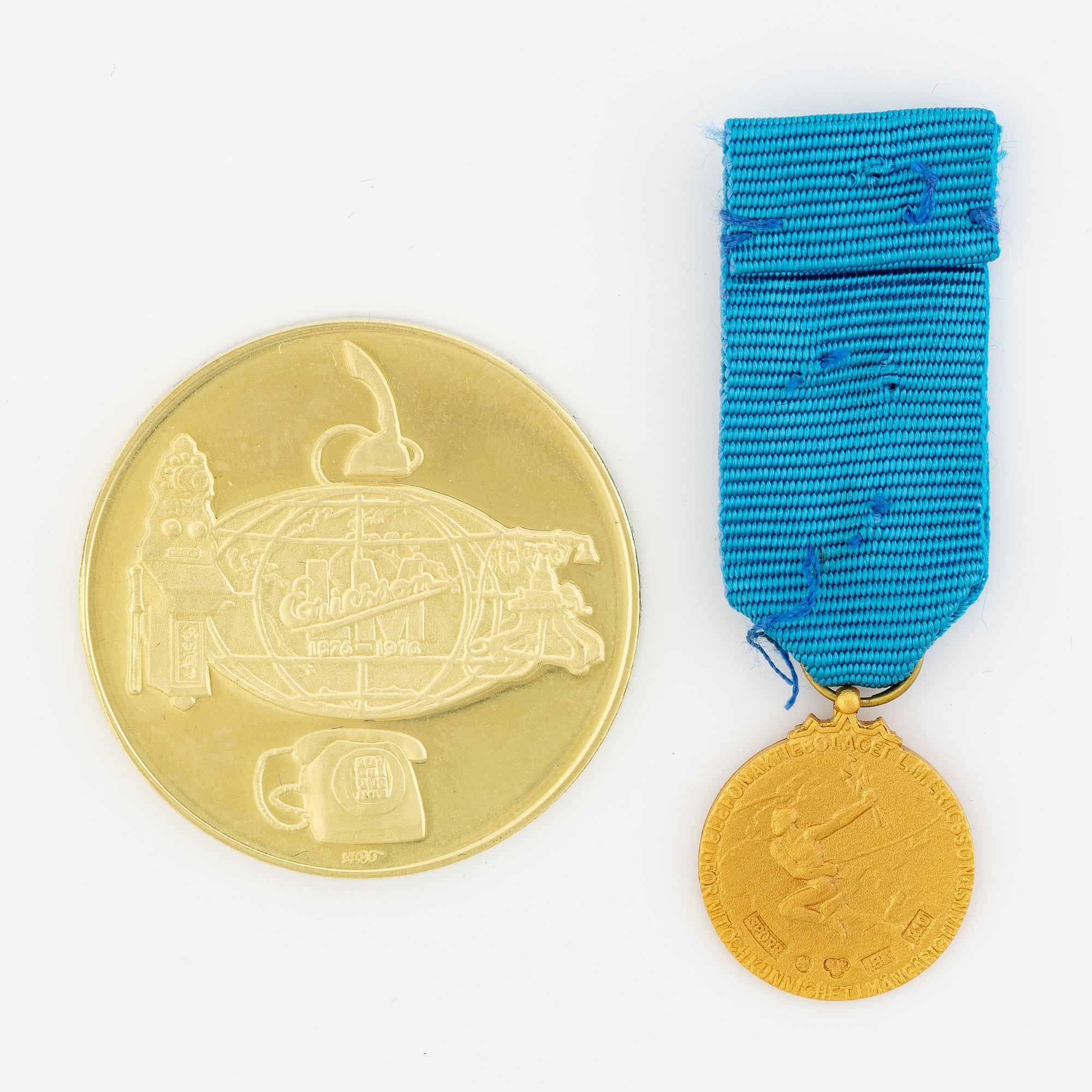 Guldmedalj samt miniatyr i guld, LM Ericson, 18K.