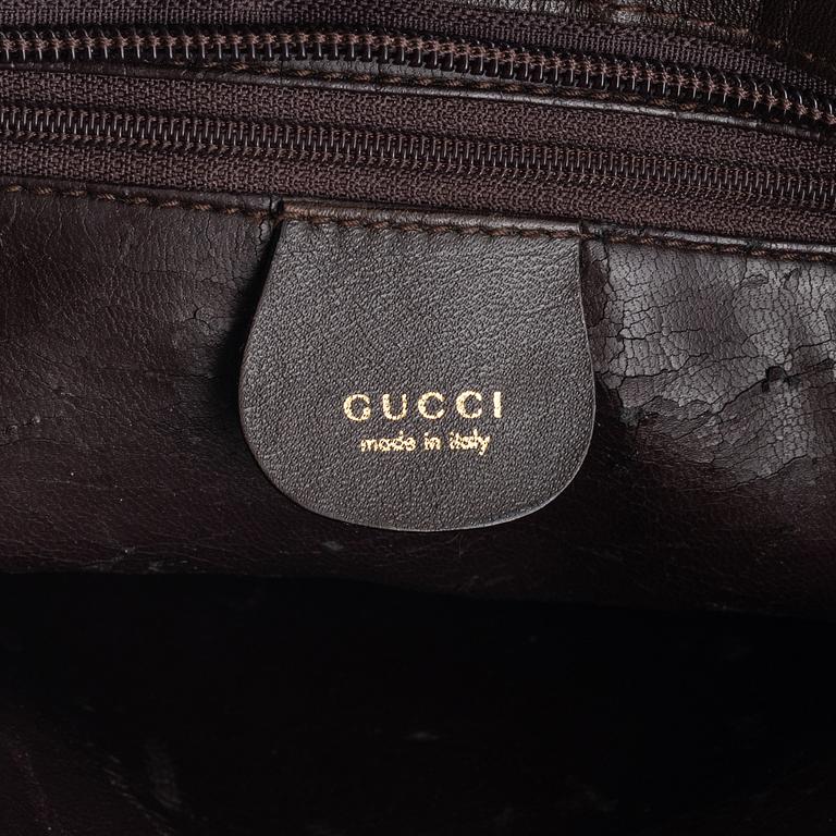 Gucci, a handbag.