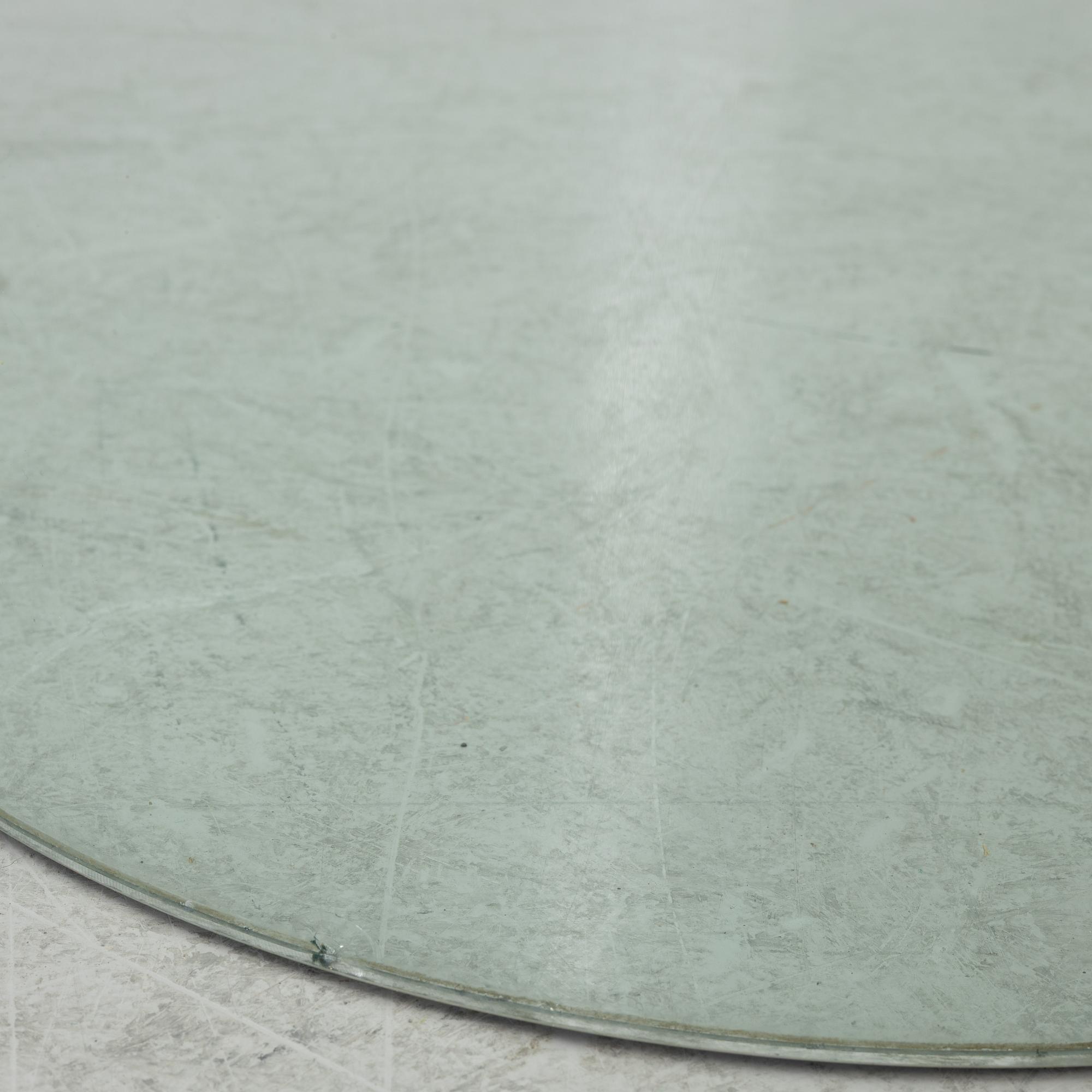 A dining table, glass, contemporary.