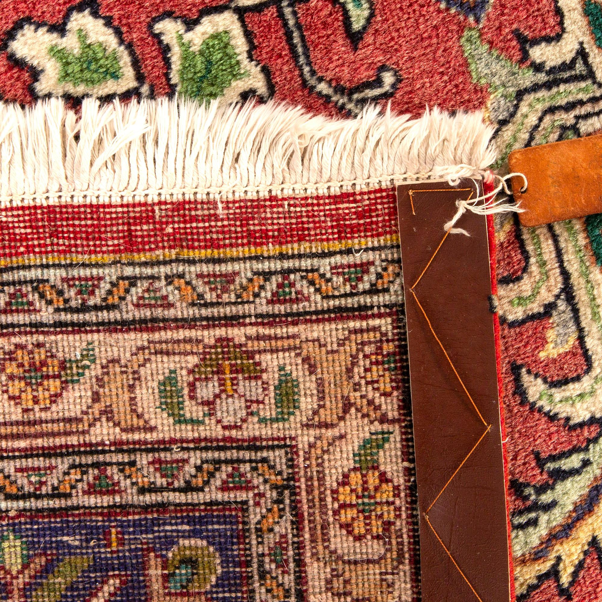 A semiantique Tabriz carpet ca 370x296 cm.