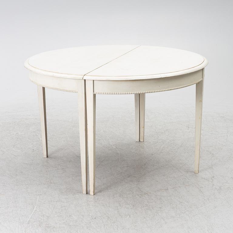A Gustavian style dining table, late 20th Century.
