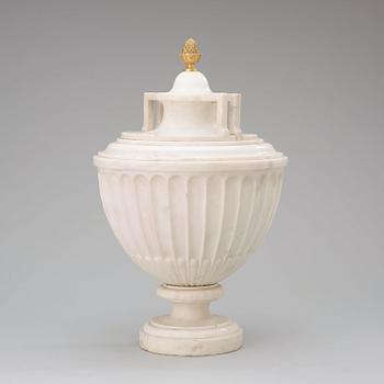 A late Gustavian circa 1800 white marble urn with cover.