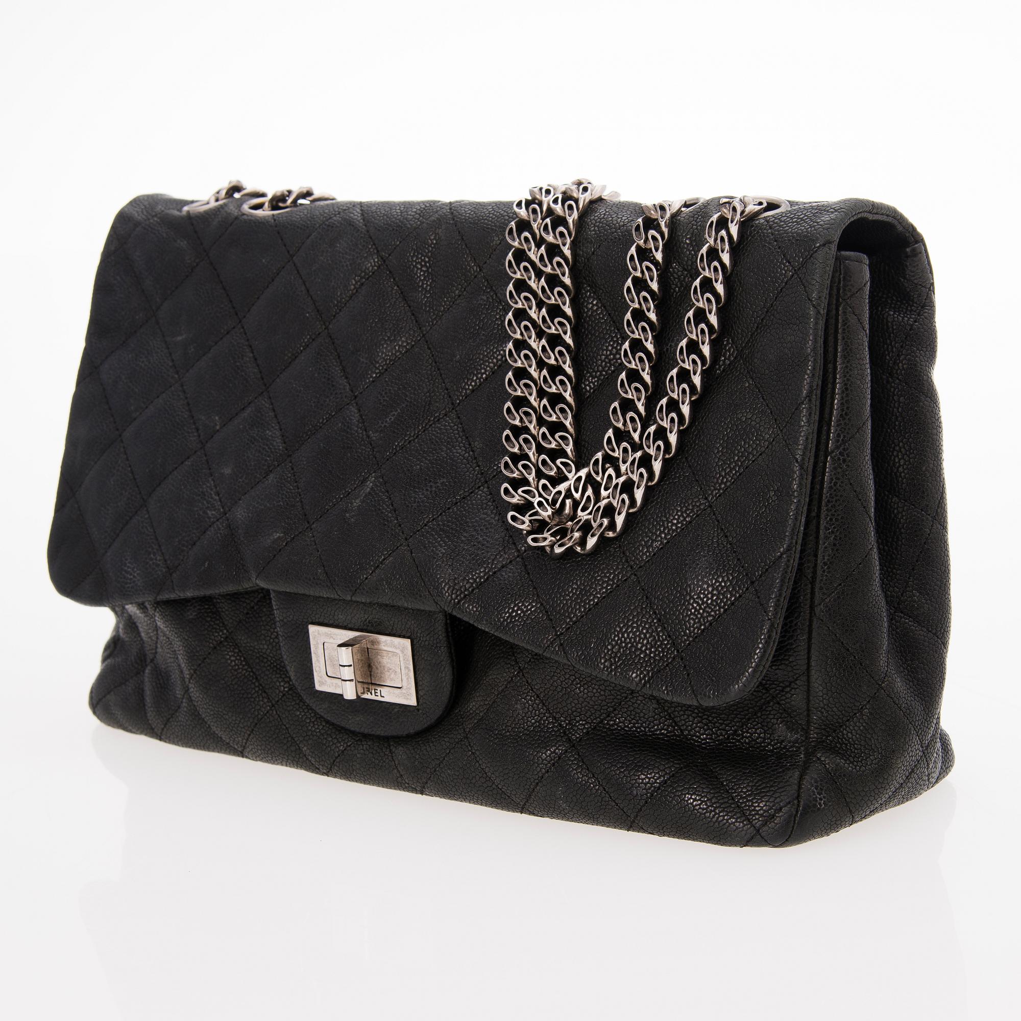 CHANEL Caviar Reissue 2.55 Jumbo Single Flap Bag.