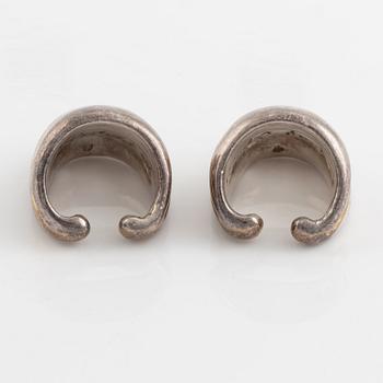 Two silver rings.