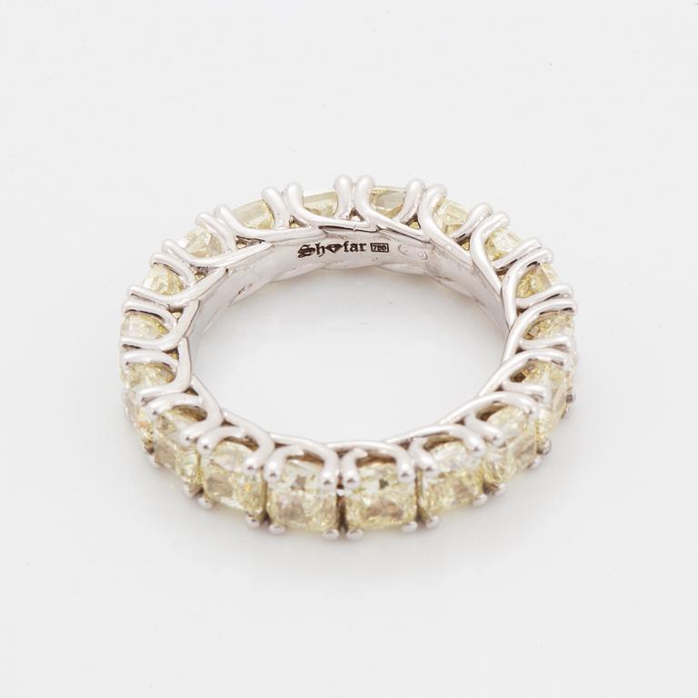 Cuschion-cut diamond eternity ring.