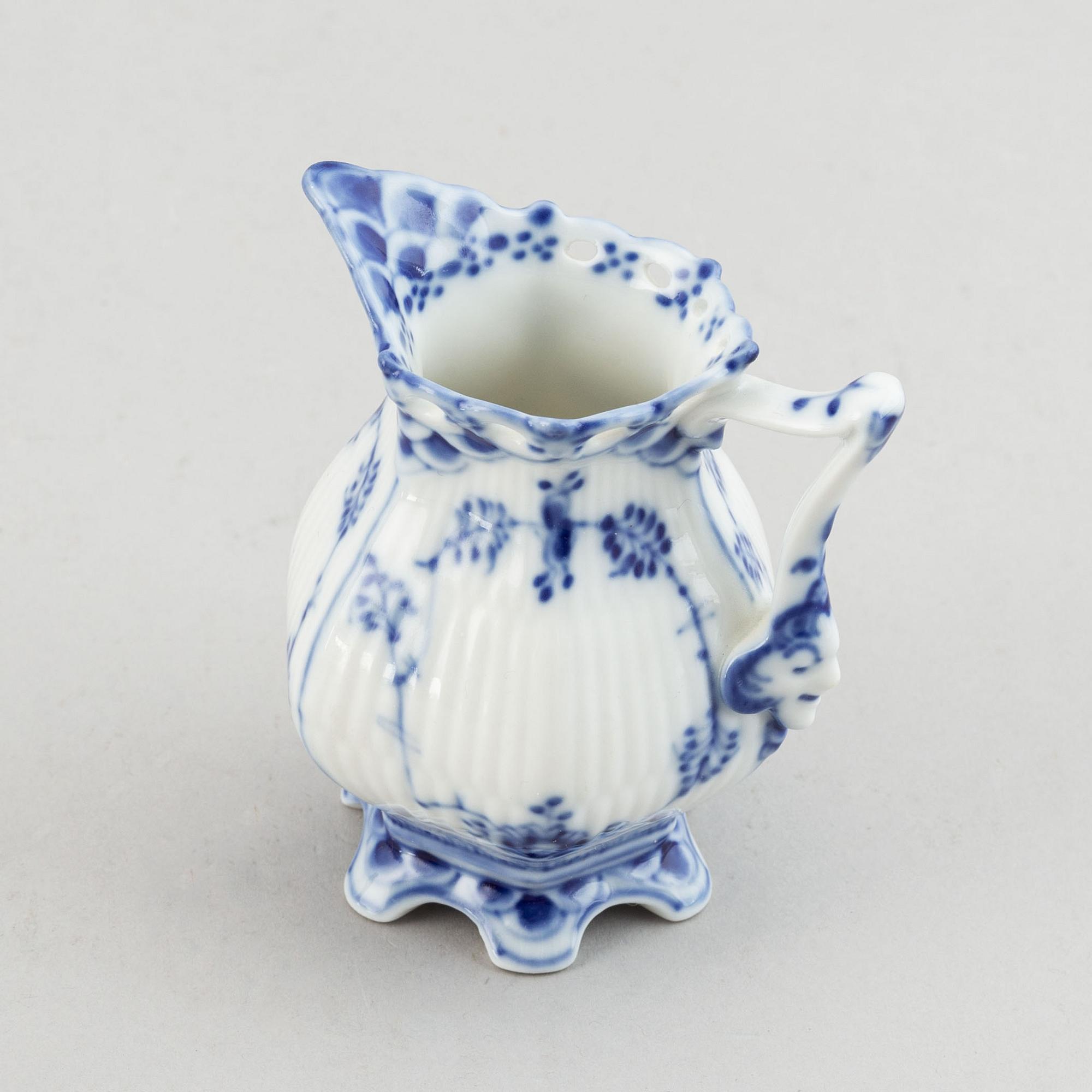 A three piece Royal Copenhagen "Blue Fluted" full lace coffee service.