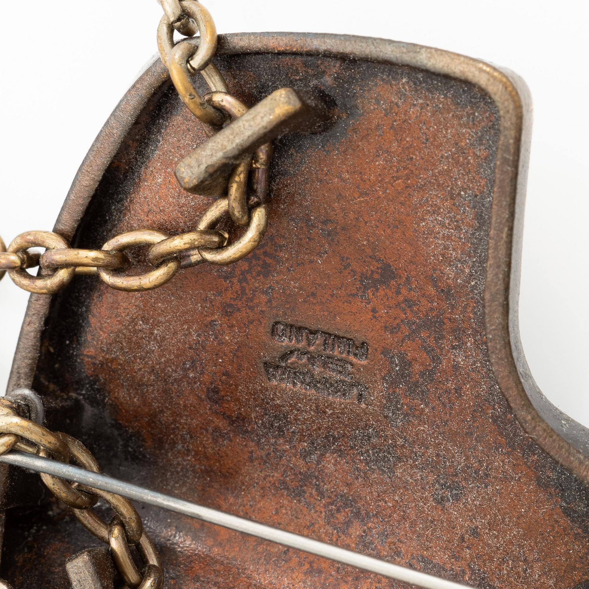 Björn Weckström, Pendant/brooch, bronze, "International Arms Inc.", Lapponia, Finland.
