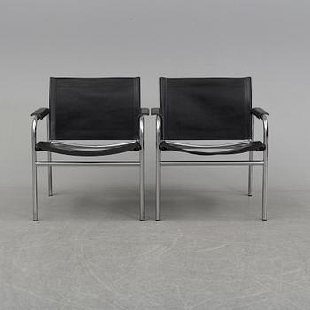 TORD BJÖRKLUND, a pair of 'Klinte' tubular steel easy chairs from IKEA.