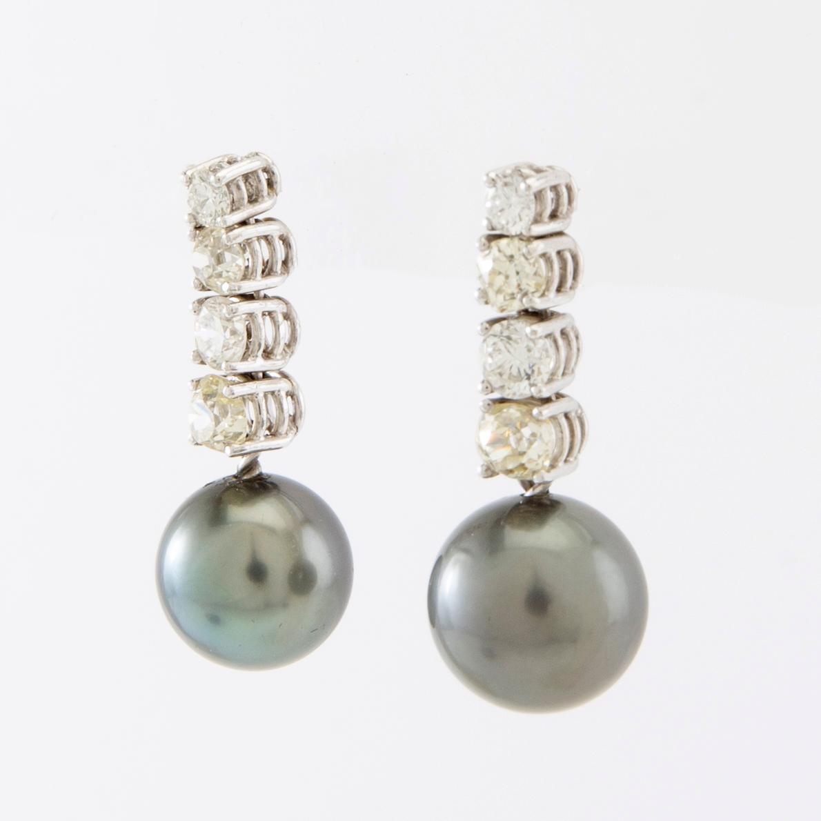 Earrings, a pair of 18K white gold with diamonds and cultured pearls.