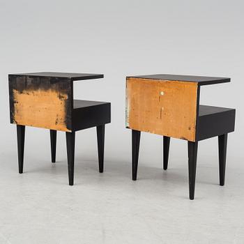 A pair of mid 1900s bedside tables.