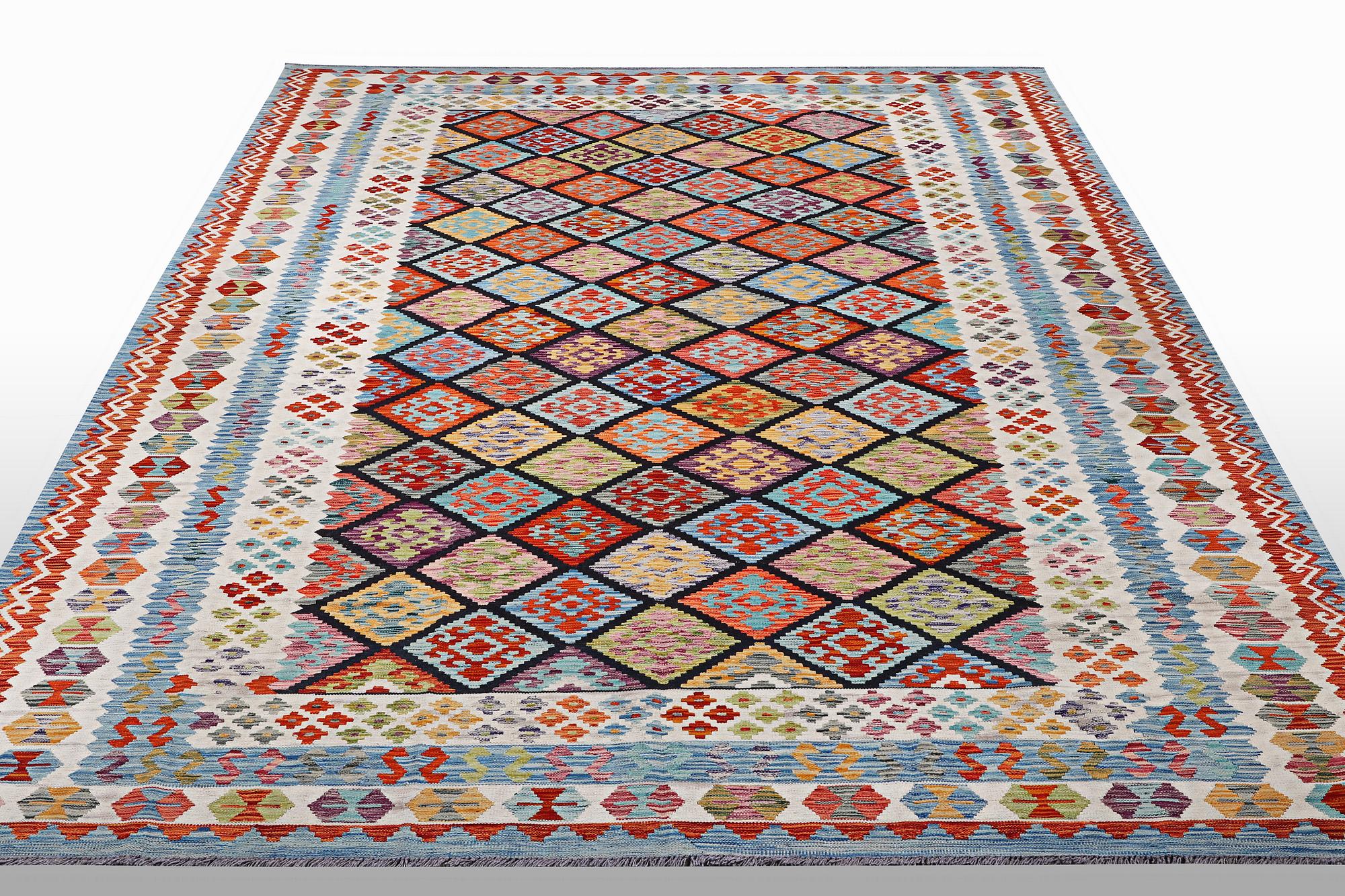 A carpet, kilim 343 x 250 cm.