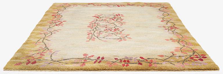 A knotted pile carpet, c. 275 x 177 cm, signed ES-FV-AJ.